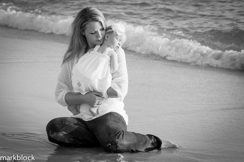 Portrait photo of a mother and infant daughter on Naples beach by Mark Block Photography